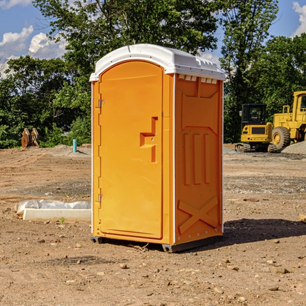 what is the cost difference between standard and deluxe portable restroom rentals in Peach Creek